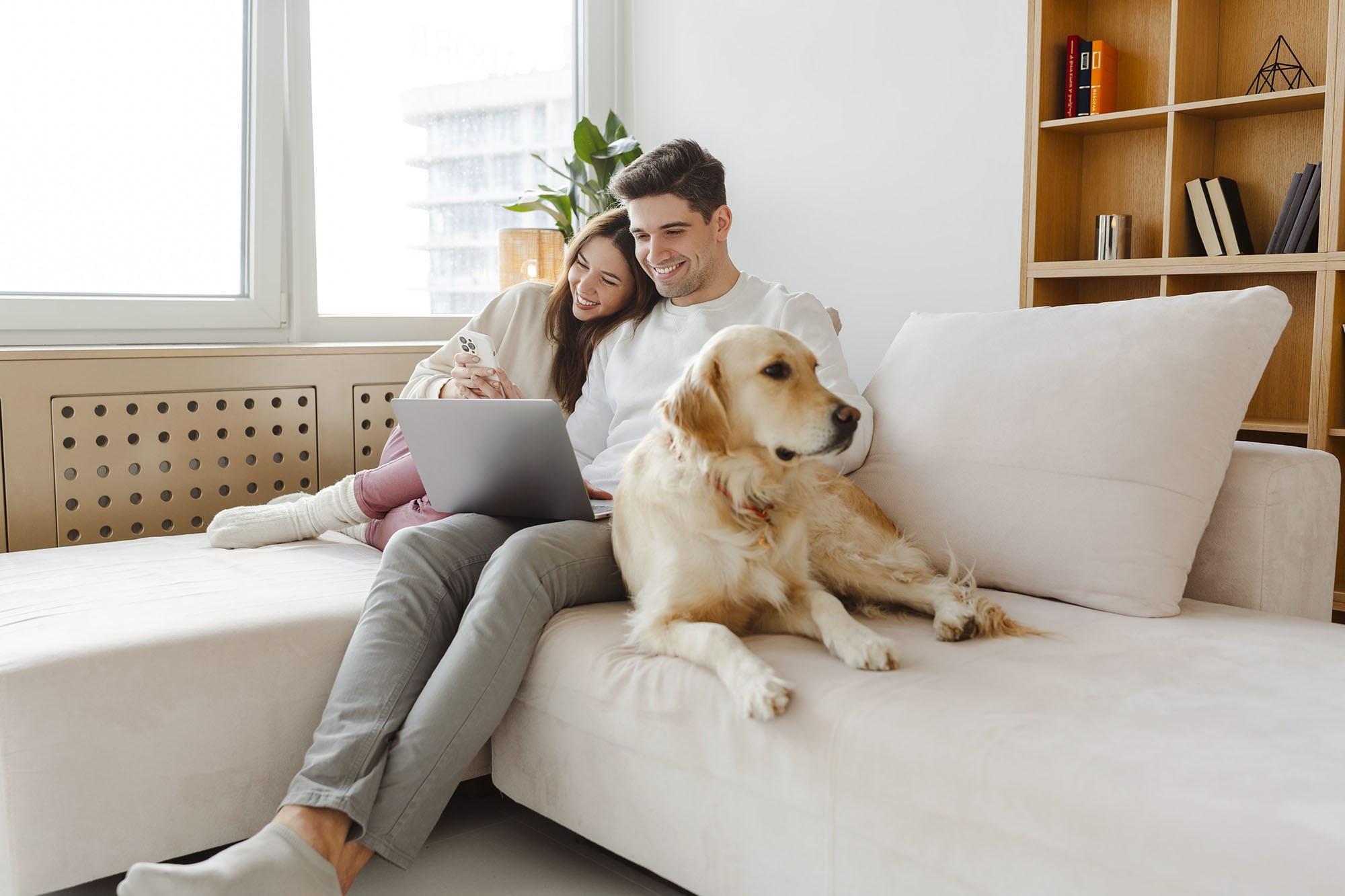 Couple on Couch with Dog