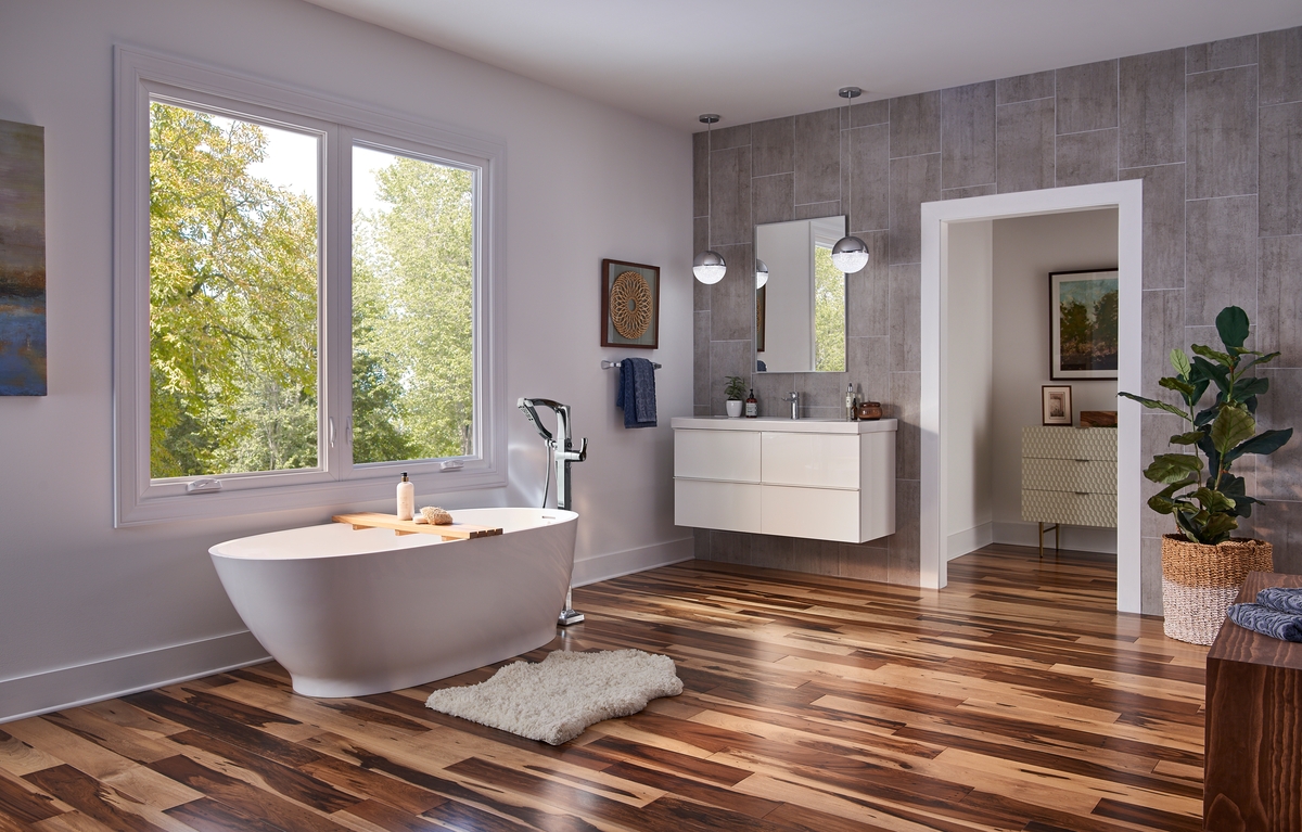 Beautiful bathroom with large scenic window Beautiful bathroom with large scenic window