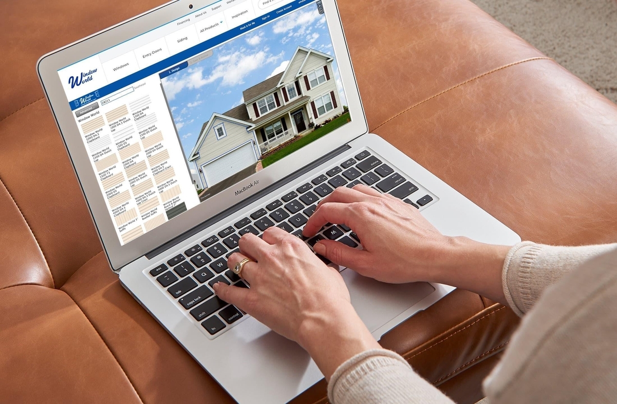 Someone using the Window World Design Center on their computer Someone using the Window World Design Center on their computer